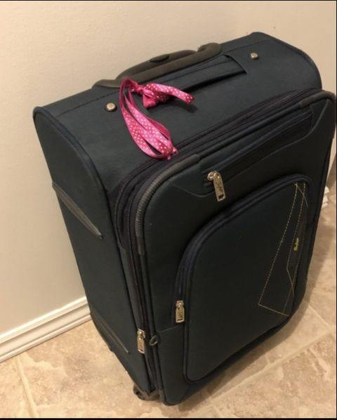 Suitcases on a baggage carousel